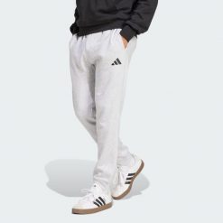 Spodnie polarowe Essentials Feelcozy. Czarne spodnie sportowe męskie Adidas, z polaru. Za 219.00 zł.