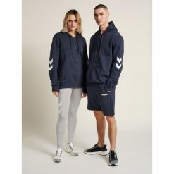 Kurtka z kapturem Hummel hmlLEGACY zip. Niebieskie kurtki damskie HUMMEL, xs, bez wzorów, z kapturem. Za 194.00 zł.
