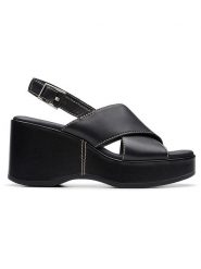 Clarks Skórzane sandały "Manon Wish" w kolorze czarnym na koturnie rozmiar: 41. Czarne sandały damskie Clarks, bez wzorów, bez obcasa, na koturnie. Za 219.60 zł.