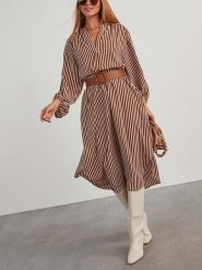 Milan Kiss Sukienka w kolorze brązowo-białym rozmiar: S. Brązowe sukienki damskie Milan Kiss, s, bez wzorów, bez kołnierzyka, bez ramiączek, midi. Za 202.50 zł.
