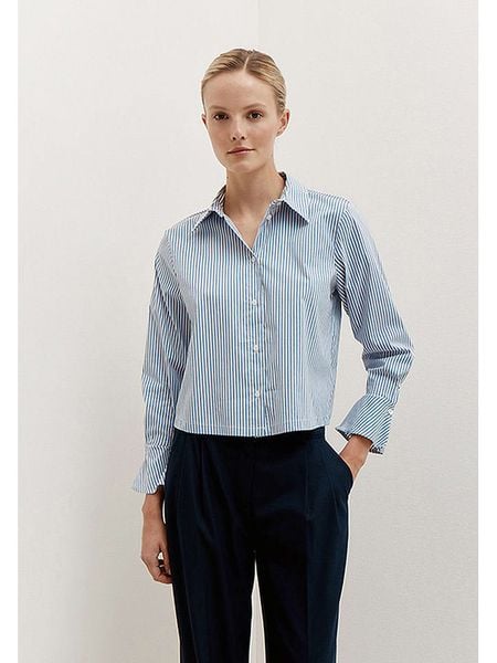 More & More Bluzka w kolorze błękitnym rozmiar: 36. Niebieskie bluzki damskie MORE & MORE, bez wzorów, bez kołnierzyka, bez ramiączek. Za 139.87 zł.