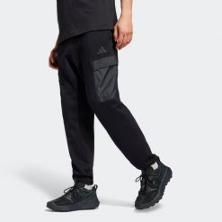 Spodnie męskie ADIDAS. Spodnie materiałowe męskie Adidas, bez wzorów, z bawełny. Za 199.99 zł.