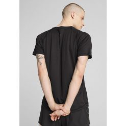 Męska koszulka do biegania VELOCITY PUMA Black. Czarne t-shirty sportowe męskie Puma, m, bez ramiączek, do biegania. Za 129.00 zł.