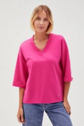 Bluza oversize z dekoltem w serek fuksjowa. Bluzy bez kaptura damskie MOODO, l, z bawełny. Za 79.99 zł.