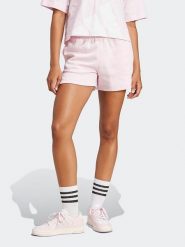 Adidas Szorty dresowe w kolorze jasnoróżowym rozmiar: XL. Różowe szorty damskie Adidas, bez wzorów, z dresówki. Za 96.83 zł.