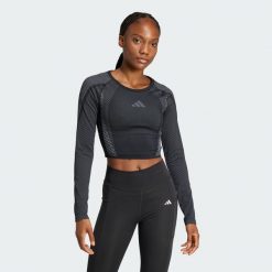 Koszulka Seamless Knitted Long Sleeve. Czarne bluzki sportowe damskie Adidas, xs, bez wzorów, z materiału, bez ramiączek. Za 249.00 zł.