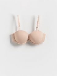 Biustonosz balconette push up - kremowy. Białe biustonosze Reserved, bez wzorów. W wyprzedaży za 55.99 zł.