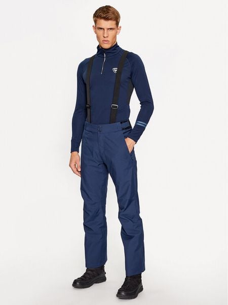 Rossignol Spodnie narciarskie RLMMP02 Granatowy Regular Fit. Niebieskie spodnie materiałowe męskie Rossignol, bez wzorów, z syntetyku, sportowe. Za 629.00 zł.
