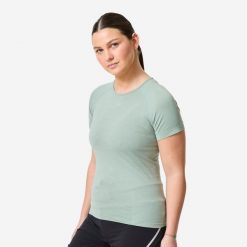 Koszulka do biegania damska Kiprun Run 500 Comfort. Zielone bielizna termoaktywna damska KIPRUN, l, bez wzorów, z elastanu. Za 89.99 zł.