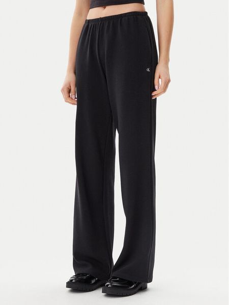 Calvin Klein Jeans Spodnie dresowe J20J225537 Czarny Straight Fit. Czarne jeansy damskie Calvin Klein Jeans, xs, bez wzorów, z bawełny. Za 229.99 zł.