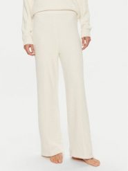 Calvin Klein Spodnie piżamowe 000QS7338E Écru Relaxed Fit. Piżamy damskie CALVIN KLEIN, l, bez wzorów, z syntetyku, bez ramiączek. Za 149.99 zł.