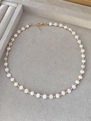 Nakkash Pozłacany naszyjnik z masą perłową - dł. 42 cm rozmiar: onesize. Białe naszyjniki damskie Nakkash, pozłacane. Za 39.99 zł.