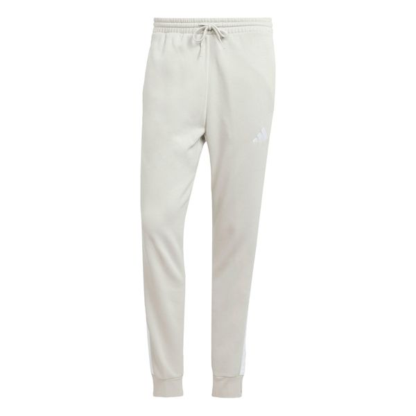 Spodnie do biegania adidas Essentials 3-Stripes Fleece. Czarne spodnie materiałowe męskie Adidas, bez wzorów, z dresówki, sportowe. Za 251.00 zł.