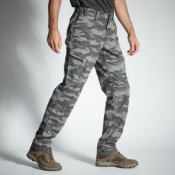 Spodnie outdoor Solognac 100 camo. Szare spodnie materiałowe męskie SOLOGNAC, bez wzorów, z bawełny, sportowe. Za 99.99 zł.