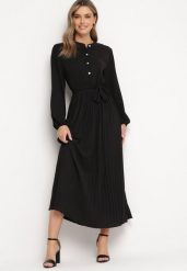 Czarna Rozkloszowana Sukienka Maxi z Plisowanym Dołem i Wiązanym Paskiem Nollira. Czarne sukienki damskie Born2be, bez wzorów, eleganckie, bez kołnierzyka, bez ramiączek, maxi, plisowane. W wyprzedaży za 111.99 zł.