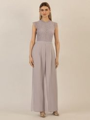 APART Kombinezon w kolorze fioletowym rozmiar: 42. Różowe kombinezony damskie Apart, bez wzorów, z koronki, bez kołnierzyka, bez ramiączek. Za 257.92 zł.