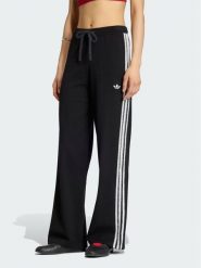 Adidas Spodnie dresowe Firebird KS9363 Czarny Regular Fit. Czarne spodnie dresowe damskie Adidas, s, bez wzorów, z dresówki. Za 298.99 zł.