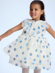 Tiulowa sukienka z cekinami - kremowy. Białe sukienki dziewczęce Reserved, bez wzorów, z dzianiny, bez ramiączek. Za 89.99 zł.