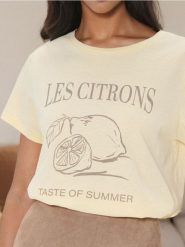 Koszulka z nadrukiem w cytryny - żółty. Żółte t-shirty damskie Sinsay, l, bez wzorów, z bawełny, bez kołnierzyka. Za 9.99 zł.