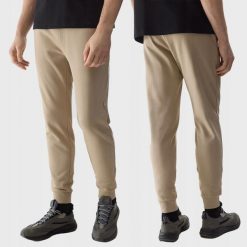 SPODNIE DRESOWE MĘSKIE 4F JOGGERY DRESY SPORTOWE TTROM603 3XL. Brązowe spodnie sportowe męskie 4f, z bawełny. Za 149.99 zł.