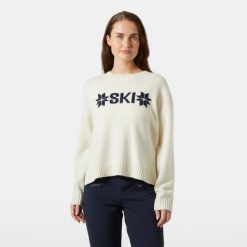 Damski sweter z dzianiny Helly Hansen Bliss. Białe swetry klasyczne damskie Helly Hansen, na zimę, z dzianiny, bez kołnierzyka. Za 710.00 zł.