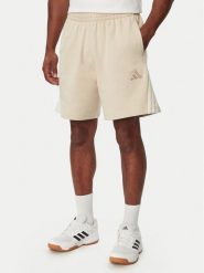 Adidas Szorty sportowe Adidas Kit 3-Stripes KW2385 Beżowy Loose Fit. Brązowe szorty męskie Adidas, bez wzorów, z bawełny, sportowe. Za 199.99 zł.