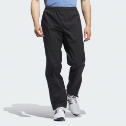 Spodnie RAIN.RDY Golf. Czarne spodnie materiałowe męskie Adidas, bez wzorów, z materiału, sportowe. Za 569.00 zł.