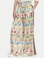 Adidas Spodnie dresowe Farm Rio KZ5537 Kolorowy Loose Fit. Spodnie dresowe damskie Adidas, xs, bez wzorów, z dresówki. Za 599.99 zł.