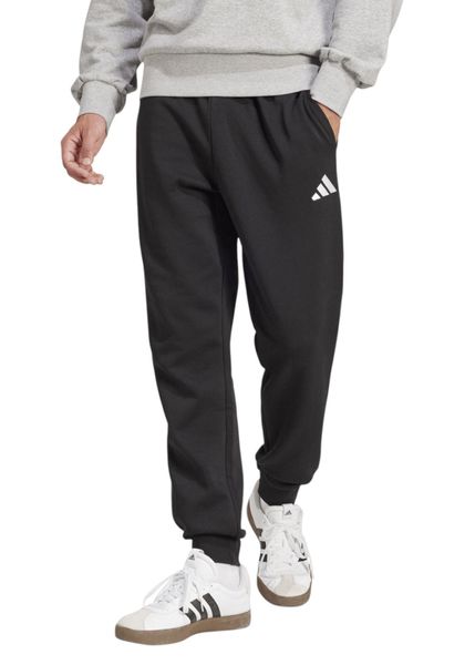 Spodnie męskie adidas Essentials Feelcozy. Czarne spodnie materiałowe męskie Adidas, bez wzorów, z bawełny, klasyczne, z standardowym stanem. Za 232.00 zł.