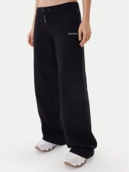 Guess Jeans Spodnie dresowe W6RB52 K68I4 Czarny Regular Fit. Czarne jeansy damskie Guess Jeans, xs, z aplikacjami, z bawełny. Za 299.99 zł.