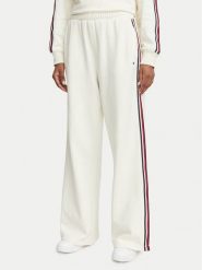Tommy Hilfiger Spodnie dresowe UW0UW06628 Kremowy Wide Leg. Białe spodnie dresowe damskie Tommy Hilfiger, s, bez wzorów, z bawełny. Za 329.99 zł.