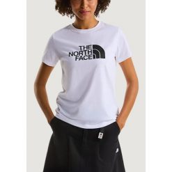Koszulka crop top Kobieta THE NORTH FACE W EVOLUTION HALF DOME SLIM SHORT SLEEVE. Białe topy damskie The North Face, bez wzorów, z bawełny, bez kołnierzyka. Za 183.10 zł.