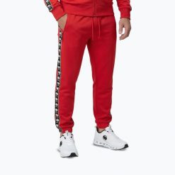 Spodnie męskie Pitbull Track Powers. Czerwone spodnie materiałowe męskie PITBULL, bez wzorów, z elastanu, sportowe. Za 229.99 zł.