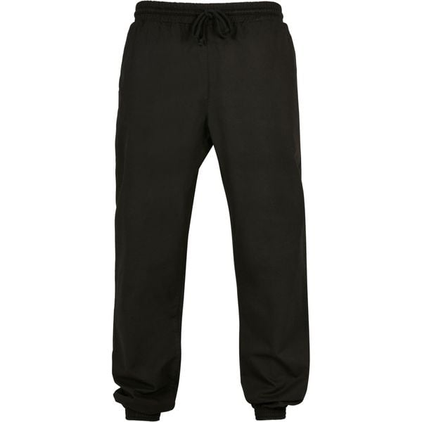 Damskie spodnie dresowe Urban Classics Basic. Czarne spodnie sportowe damskie Urban Classics, z dresówki. Za 183.50 zł.