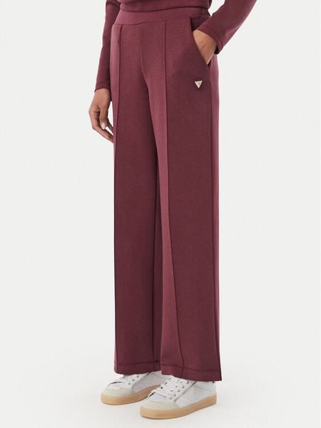 Guess Spodnie dresowe V6YB18 K4315 Bordowy Regular Fit. Czerwone spodnie dresowe damskie Guess, xxs, z aplikacjami, z dresówki. Za 394.99 zł.
