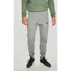 Puma - Spodnie. Zielone spodnie sportowe męskie Puma, z bawełny. W wyprzedaży za 129.90 zł.