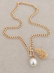 Nakkash Pozłacany naszyjnik z perłami syntetycznymi - dł. 42 cm rozmiar: onesize. Białe naszyjniki damskie Nakkash, pozłacane. Za 78.66 zł.