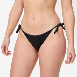 Dół kostiumu kąpielowego surfingowego damski Olaian Sofy. Czarne bikini damskie OLAIAN, bez wzorów. Za 19.99 zł.