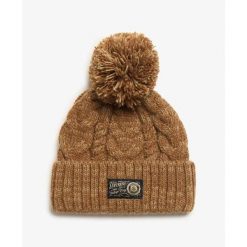 Gruba czapka w warkoczowym splocie damska Superdry. Brązowe czapki zimowe damskie Superdry., z dzianiny. W wyprzedaży za 133.85 zł.