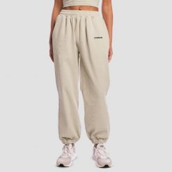 Spodnie dresowe damskie oversize z kieszeniami szare Aura. Szare spodnie sportowe damskie GYMBEAM, s, z bawełny, na fitness i siłownię. Za 131.90 zł.