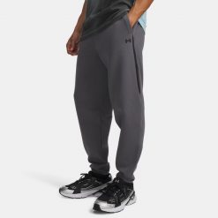 UA Unstoppable Fleece Męskie Spodnie Dresowe Szare. Szare spodnie sportowe męskie Under Armour, z bawełny. Za 572.99 zł.