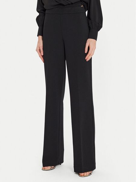 Joseph Ribkoff Spodnie materiałowe 233787 Czarny Wide Leg. Czarne spodnie materiałowe damskie Joseph Ribkoff, bez wzorów, z materiału. Za 449.99 zł.