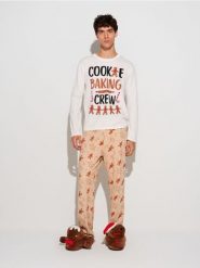 Świąteczna piżama dwuczęściowa z motywem pierniczków - wielobarwny. Piżamy męskie Sinsay, l, bez wzorów, bez ramiączek. W wyprzedaży za 24.99 zł.