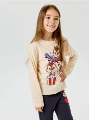 Bawełniana koszulka z długim rękawem Disney - kremowy. Białe koszulki dziewczęce Sinsay, l, bez wzorów, z bawełny, bez ramiączek. Za 15.99 zł.