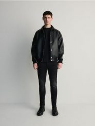 Jeansy skinny z efektem sprania - czarny. Czarne jeansy męskie Reserved. Za 129.99 zł.