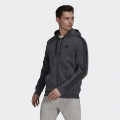Bluza z kapturem adidas Essentials Fleece 3-Stripes, Mężczyźni. Szare bluzy sportowe męskie Adidas, bez wzorów, z polaru, klasyczne, bez kołnierzyka, bez ramiączek. Za 390.00 zł.