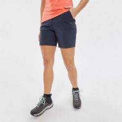 Spodenki turystyczne damskie Quechua MH100. Niebieskie szorty damskie QUECHUA, bez wzorów, z materiału, sportowe. Za 59.99 zł.