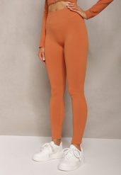 Pomarańczowe Prążkowane Legginsy z Wysokim Stanem Amokka. Brązowe legginsy damskie Renee, s, bez wzorów, z jeansu. Za 44.99 zł.