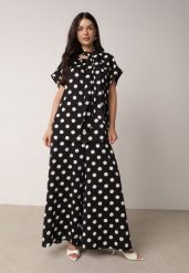 Czarny Komplet w Kropki Bluzka z Wiązaniem przy Dekolcie i Szerokie Spodnie Chrirla. Czarne spodnie materiałowe damskie Born2be, bez wzorów, eleganckie. Za 139.99 zł.