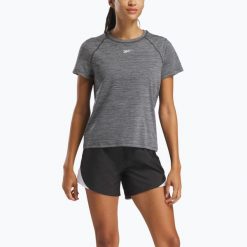 Koszulka Reebok Id Train Tee. Czarne bluzki damskie REEBOK FITNESS, bez wzorów, bez kołnierzyka. Za 79.99 zł.